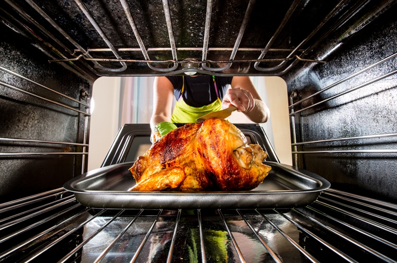 Regularly basting is a smart way to keep the bird moist and avoid a potential fire hazard.
